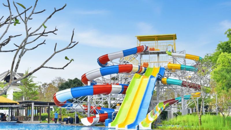Overview of Sanato Water Park with its slide system and wading pool, shot during the day